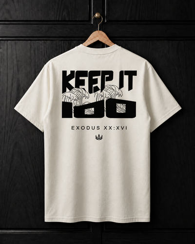 White t-shirt with black graphic design on a wooden hanger against a dark wooden background