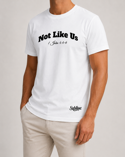 Not Like Us tee in white, front view, studio